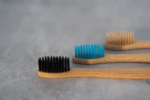 Textured or ribbed vibrators being scrubbed with a soft brush